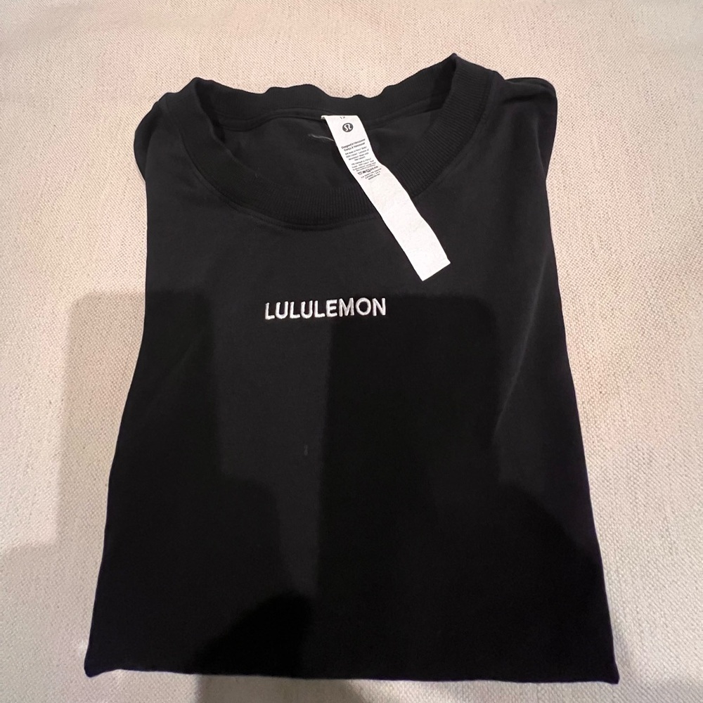 Lululemon Black ladies tshirt, size 12